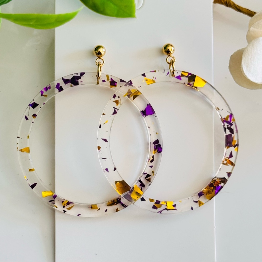 Brand new clear acrylic with purple and gold flakes, gold plated post
